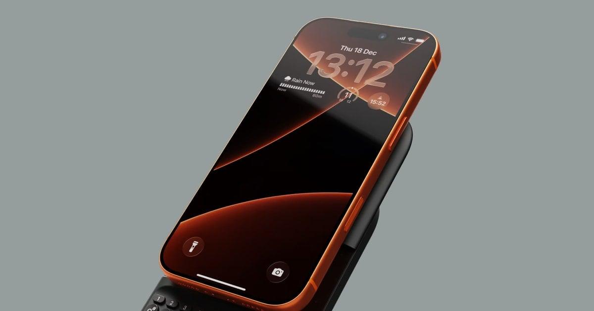 Noklikšķina Power Keyboard ar MagSafe un Qi2 viedtālruni Noklikšķina Power Keyboard, kas pievienota viedtālrunim ar MagSafe un Qi2